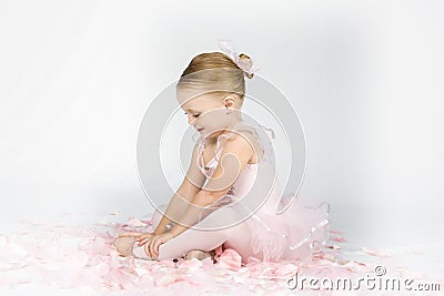 A Little Ballerina Warms Up Stock Photo
