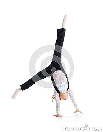 Little ballet dancer make cartwheel Stock Photo