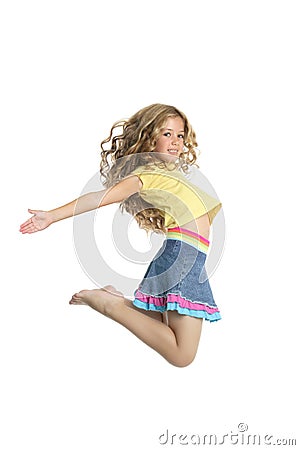 Little beautiful girl jumping isolated Stock Photo