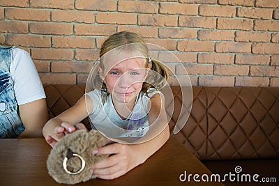 Little blond crying girl with sad expression and tears Stock Photo