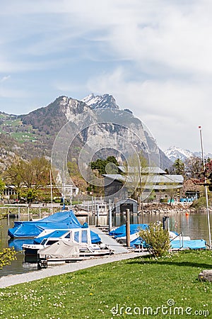 Little boats in the lake Walensee in Weesen in Switzerland Editorial Stock Photo