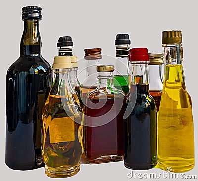 Little bottles of alcohol beverages with glass Stock Photo
