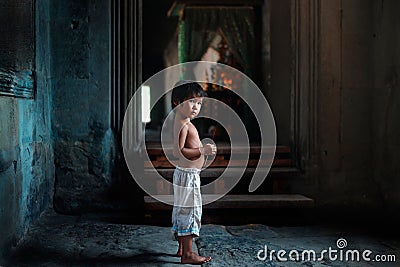 Little boy in Angkor Wat Editorial Stock Photo
