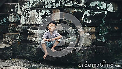 Little boy in Angkor Wat Editorial Stock Photo