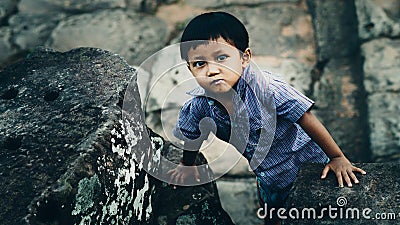 Little boy in Angkor Wat Editorial Stock Photo