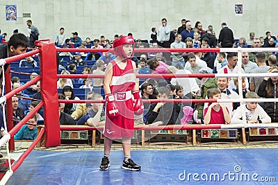 Little boy in boxing gloves on ring. russia, saratov - december, 2019 Editorial Stock Photo