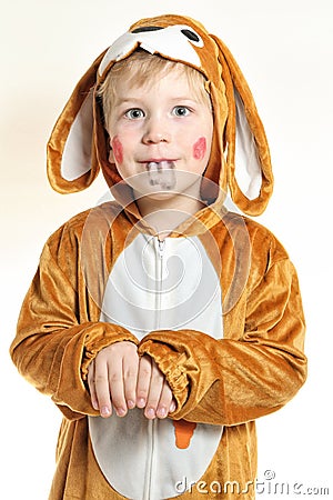 Little boy in bunny costume with painted teeth Stock Photo