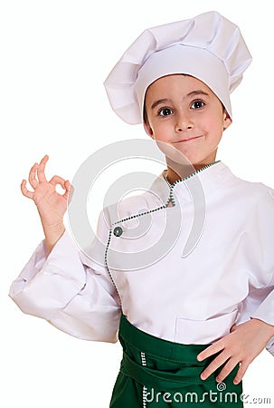 Little boy in chef uniform with ok Stock Photo