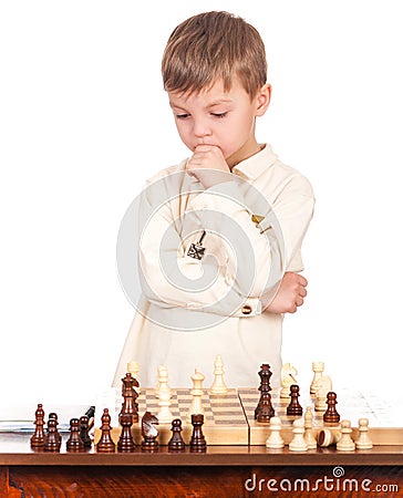 Little boy with chessboard Stock Photo