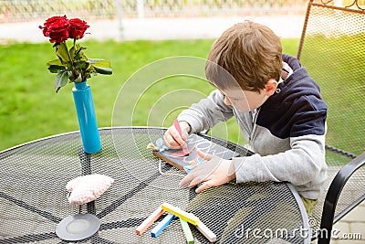 Little boy child drawing a love declaration Stock Photo