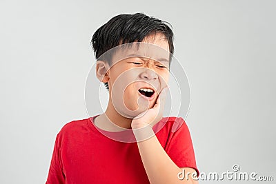 Little boy child have toothache, toothache emotions large inflated cheek emotion background Stock Photo