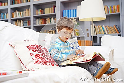 Little boy reading Stock Photo