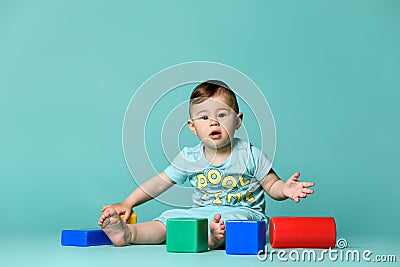 Little boy child toddler playing with block toys Stock Photo