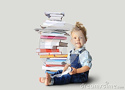 Little boy in denim overalls Stock Photo