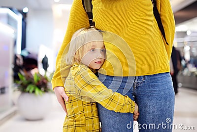 Little boy embrased his mother. Shyness, fears, anxiety Stock Photo