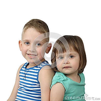 Little boy and girl sit back to back Stock Photo