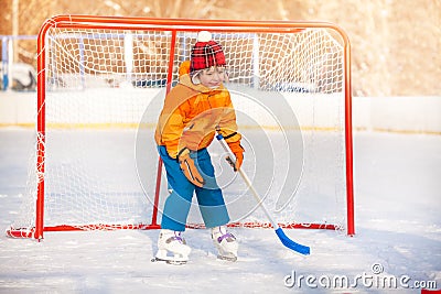 Little boy goalkeeper play ice hockey Stock Photo