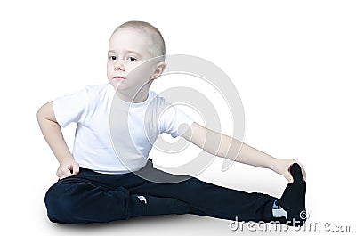 Little boy goes in for sports does exercises Stock Photo