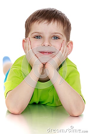 The little boy in the green shirt Stock Photo