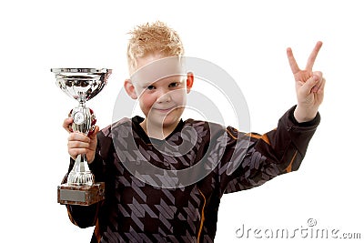 Little boy has won the second place trophy cup Stock Photo