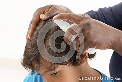 Little boy Head Lice Treatment Stock Photo