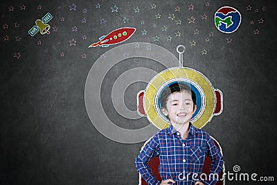 Little boy imagining being an astronaut Stock Photo