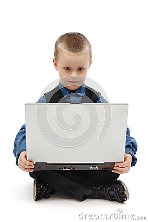 Little boy with a laptop Stock Photo