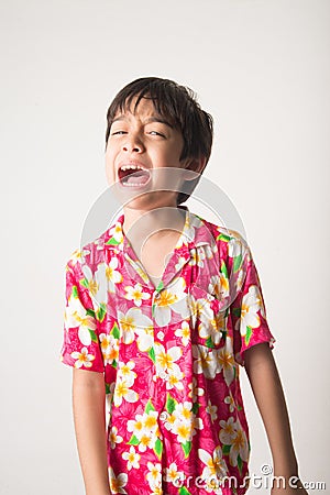 Little boy laughing portrait standing angry face Stock Photo