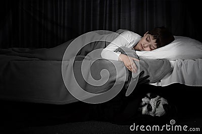 Little boy and monster under the bed. Stock Photo