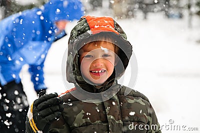Young boy out in the snow. Stock Photo