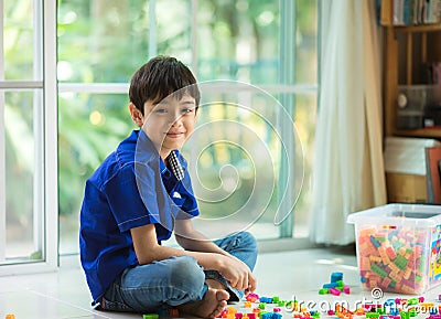 Little boy playing block indoor house Stock Photo