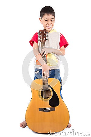 Little boy playing classic guitar course on white background Stock Photo