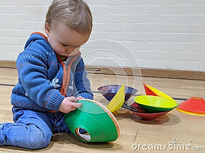 Little boy playing with marker cones Stock Photo