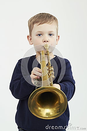 Little boy playing trumpet.music child.musical instrument Stock Photo