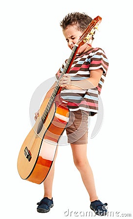 Little boy plays guitar riff Stock Photo