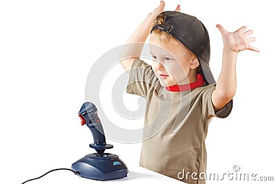 Little boy plays with a joystick Stock Photo