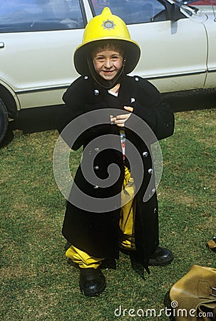 Little boy pretending to be a fireman in Brighton, England Editorial Stock Photo