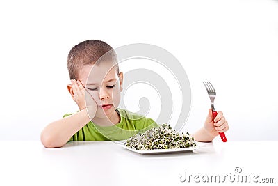 Little boy refuses to eating Stock Photo