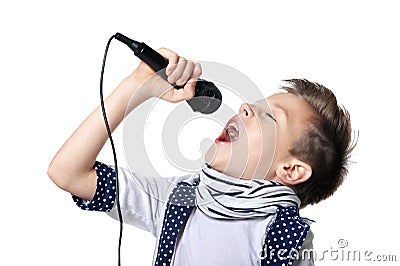 Little boy sing song in microphone Stock Photo