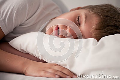 Little boy sleeping with open mouth Stock Photo