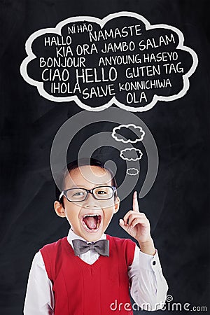 Little boy speaks in different languages Stock Photo