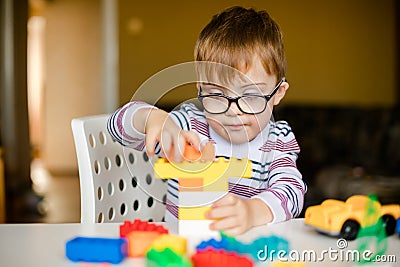 Little boy with syndrome dawn Stock Photo