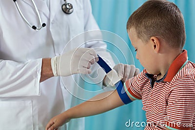 Little boy before taking blood sample Stock Photo