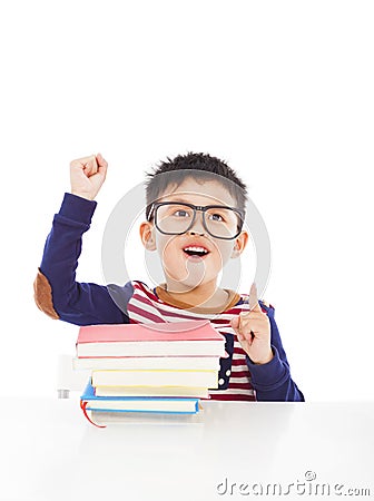 Little boy think out a good ideas and raise hand Stock Photo