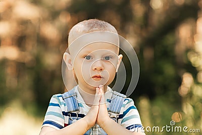 Little boy todler in nature in the summer. Portrait Stock Photo