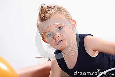 Little boy with a tuft. Stock Photo