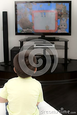 Little boy watching TV Stock Photo