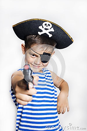 Little boy 5-6 years old wearing a pirate costume. Stock Photo