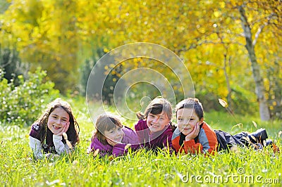 Little boys and girls laying down Stock Photo