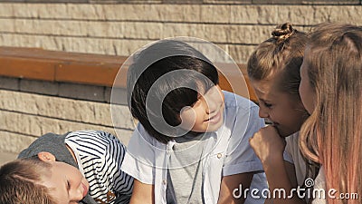 Little boys talking to the girls. Stock Photo